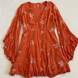 Flowy belled sleeve, flower embroidered summer dress. Side zipper and lined.